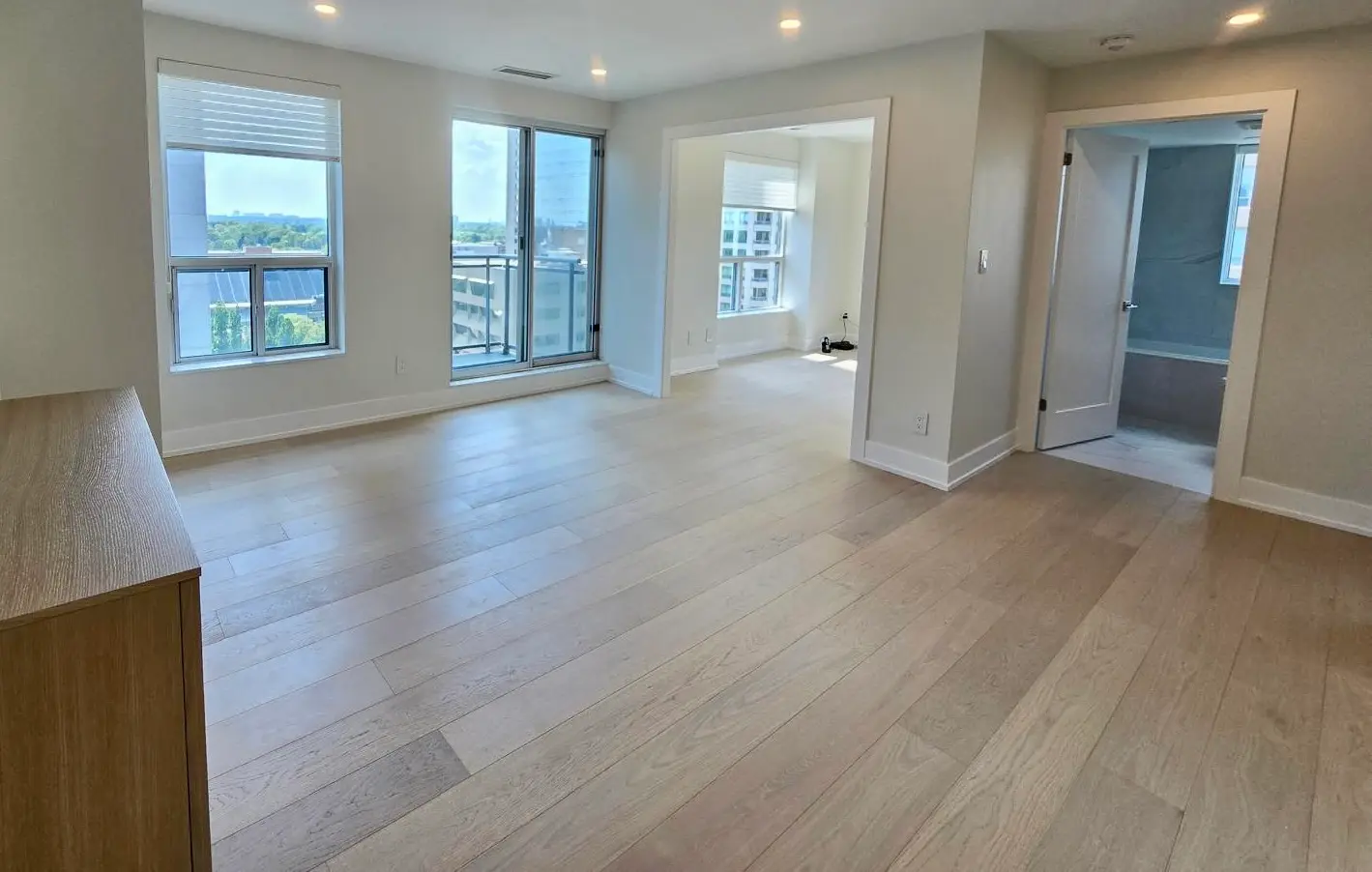 Condo open plan with light oak hardwood