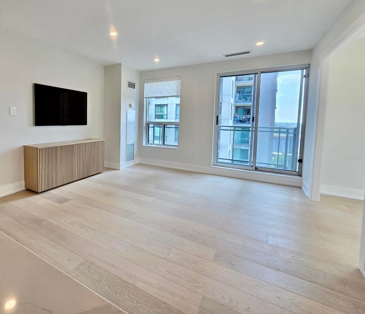 Wide plank engineered hardwood in a modern condo