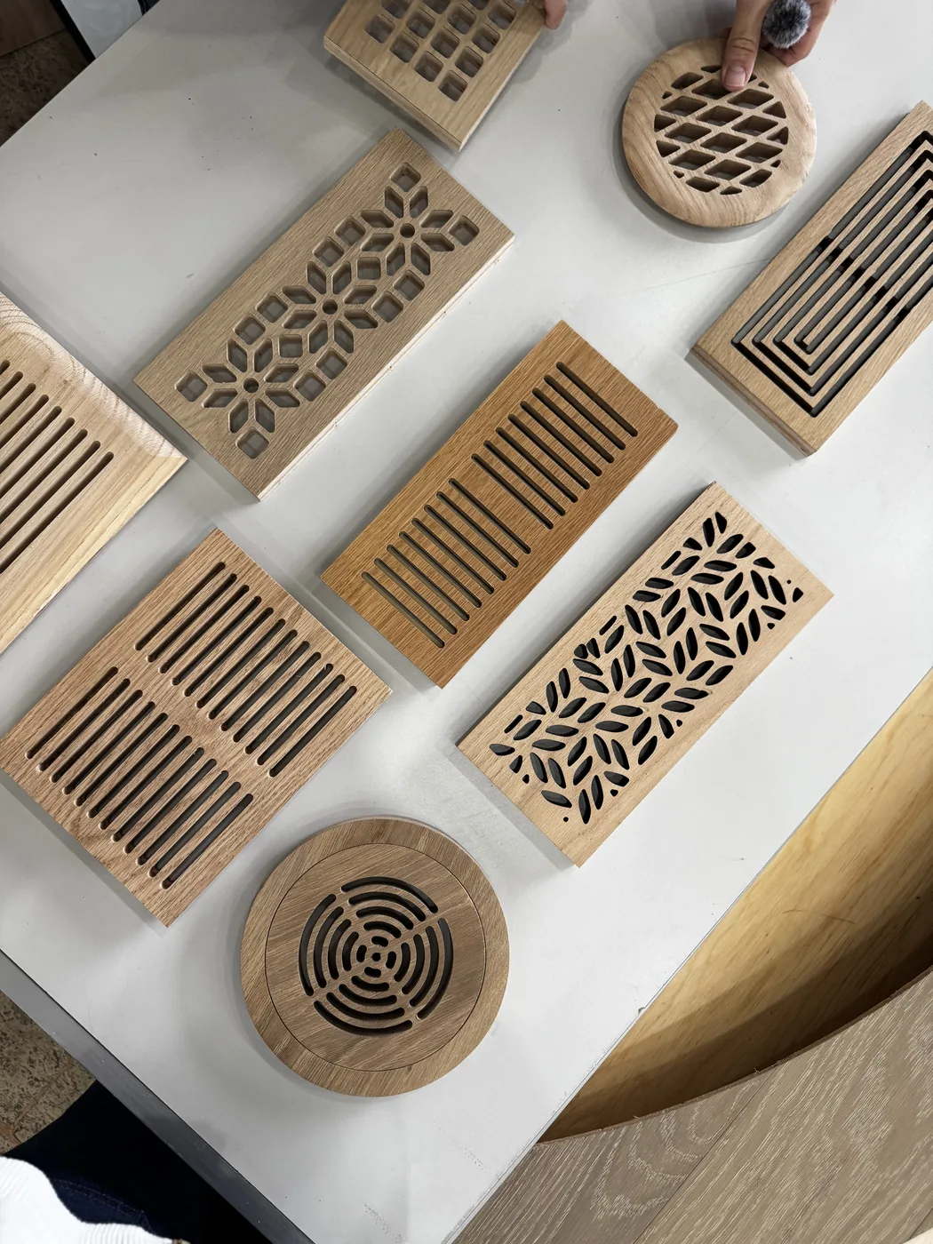 Custom carved hardwood floor registers and vent covers