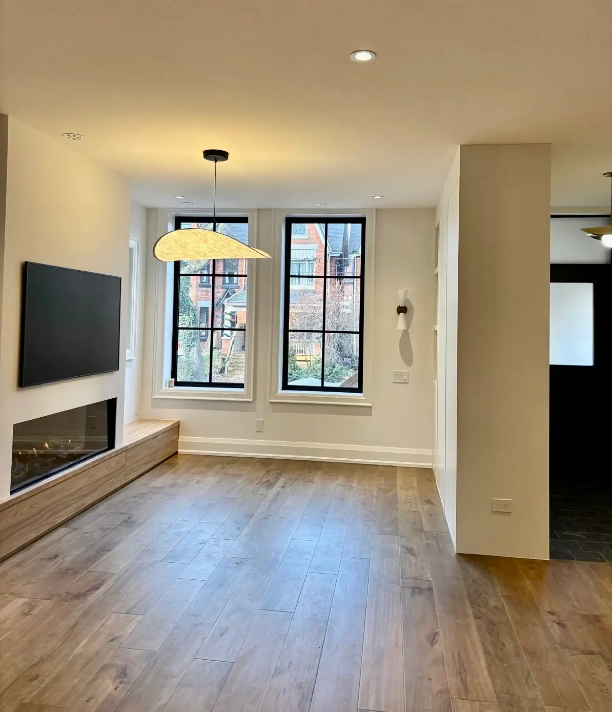Modern living room with wide plank hardwood