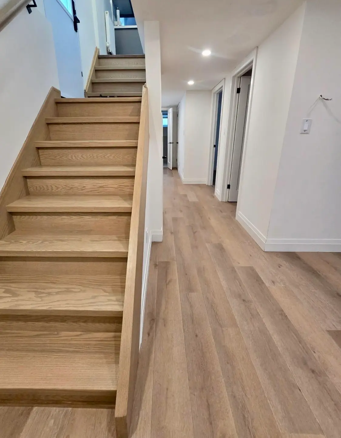 Oak staircase and hallway flooring